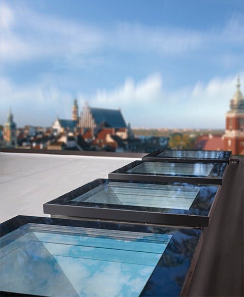 FAKRO DEF - D Electric Opening Flat Roof Window - Trusted Building Supplies