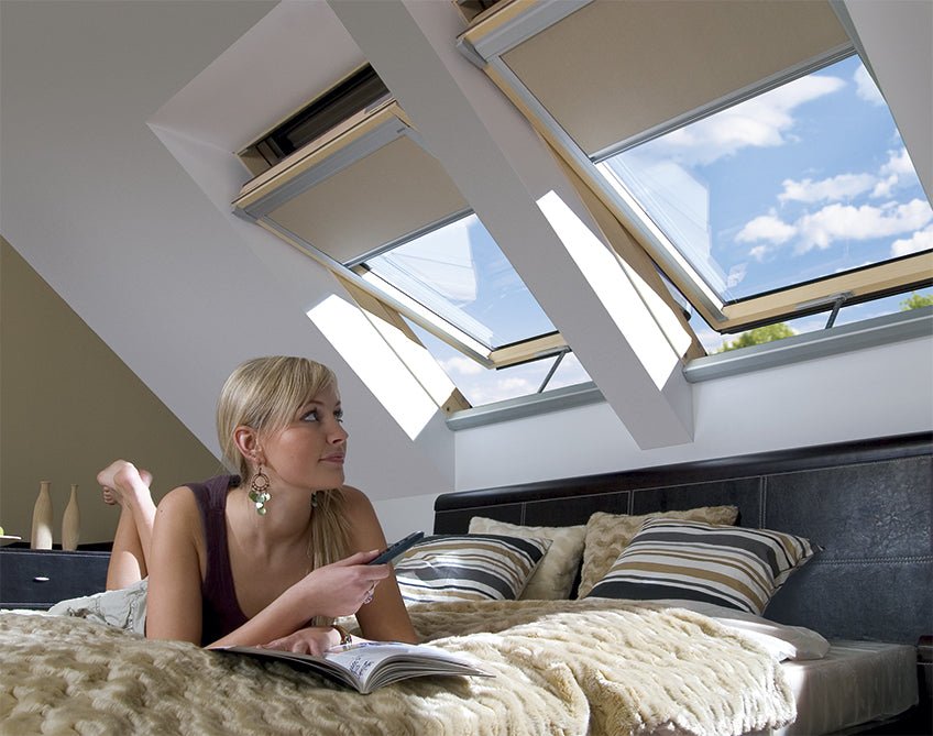 FAKRO FTU - V Z - Wave P5 White PU Coated Electric Triple Glazed Centre Pivot Roof Window - Trusted Building Supplies